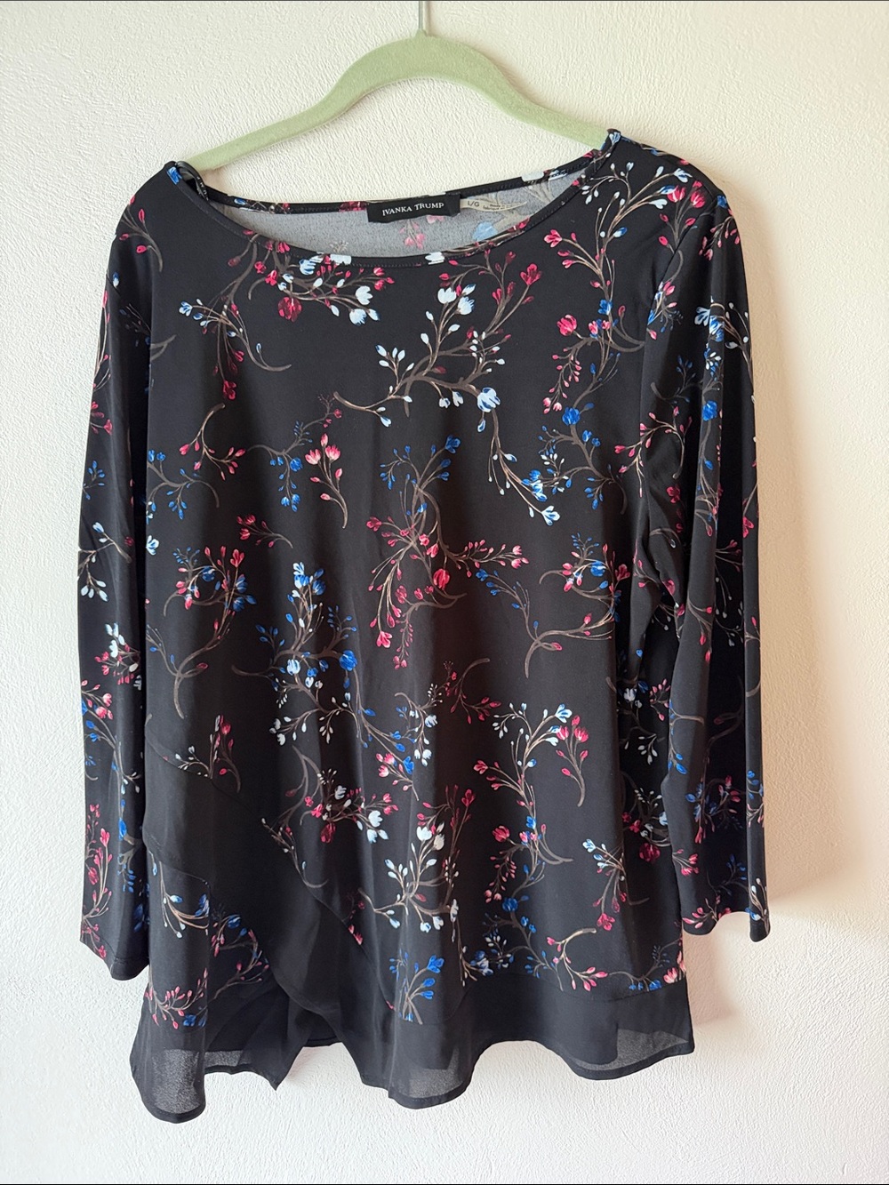 Ivanka Trump blouse
Size L
Black with red,white &blue floral print